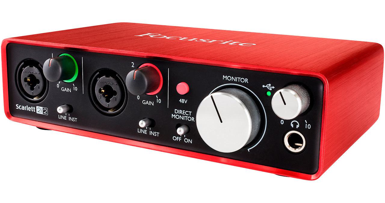 Image shows a red Focusrite Scarlett 2i2 interface against a white background.
