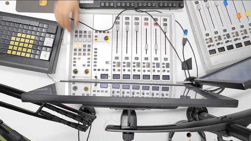 Image shows the Fuse FM mixing desks and computer, taken from above.