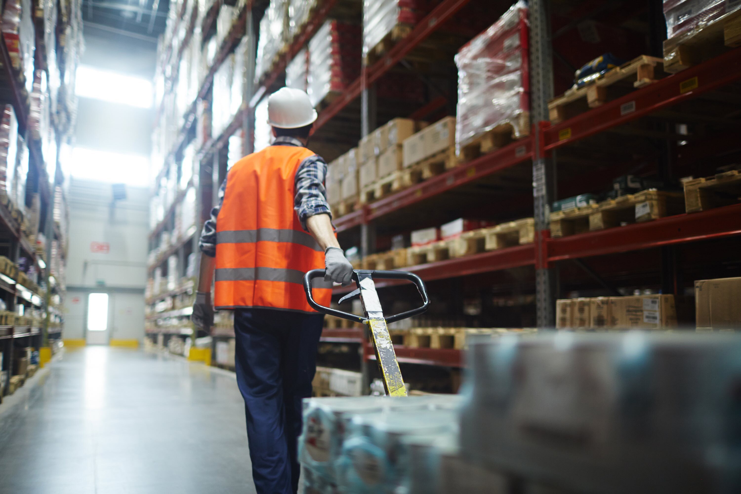 Logistics employee Pulling Forklift