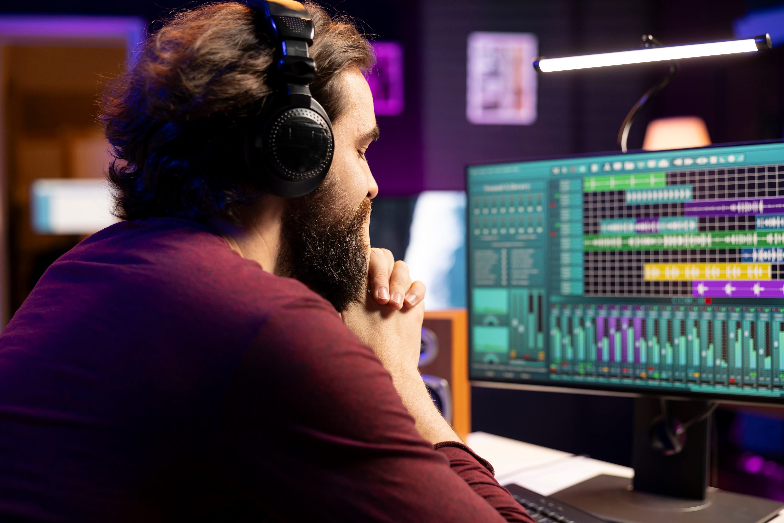 Radio station owner listening to audio