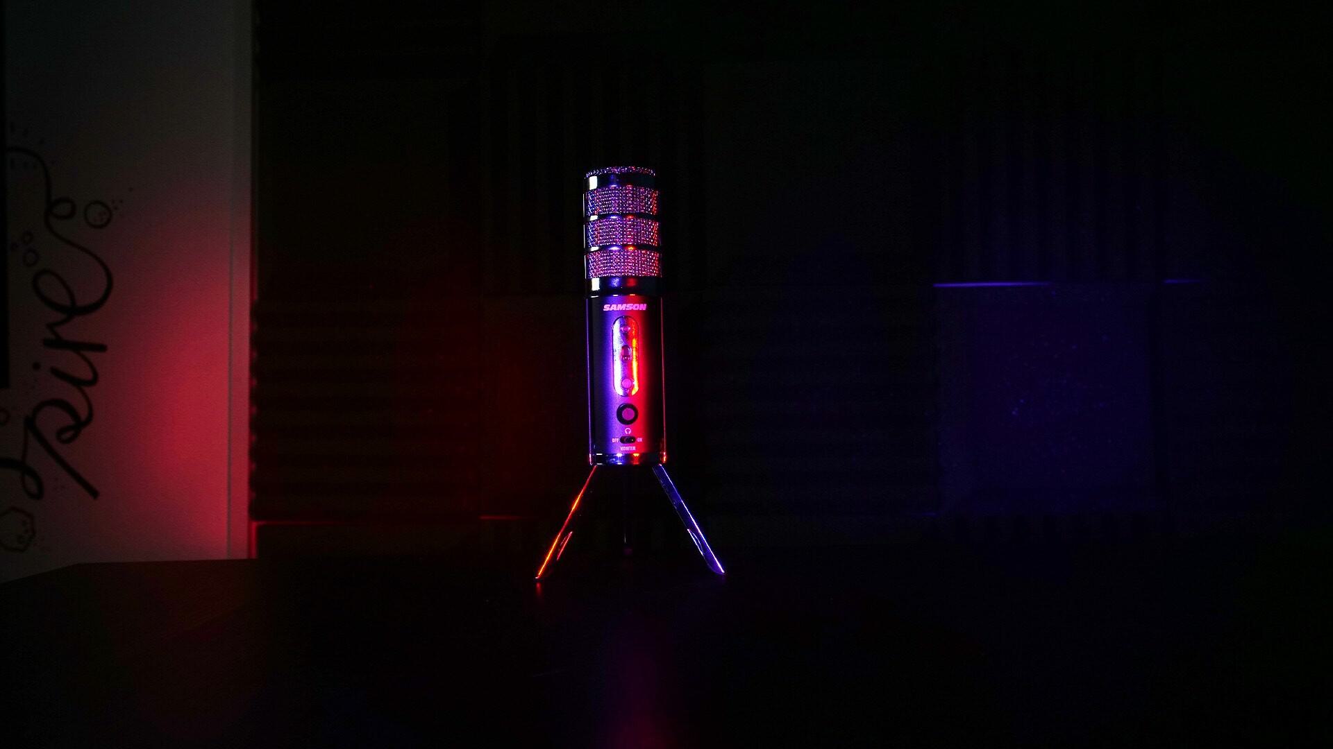 Image shows a dark room with a Samson Satellite microphone lit up by a spotlight.