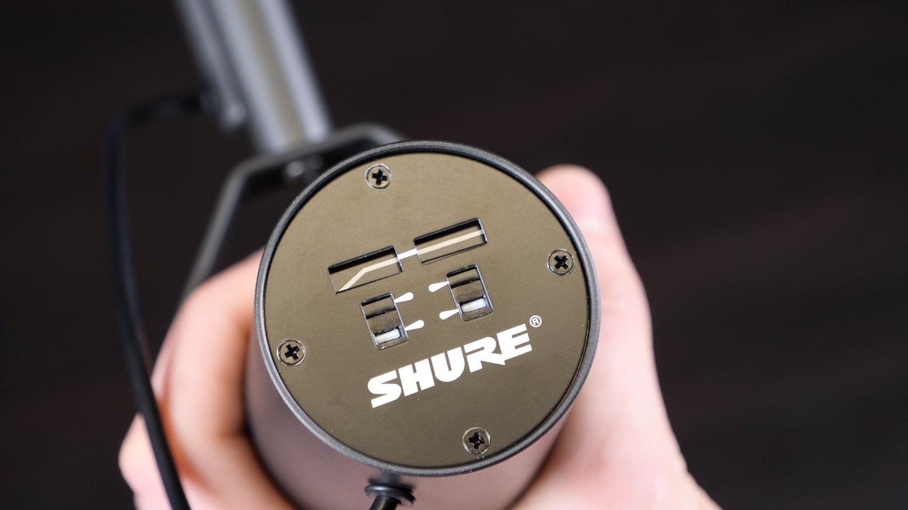 Image shows the back of a Shure SM7B where they're some setting switches.
