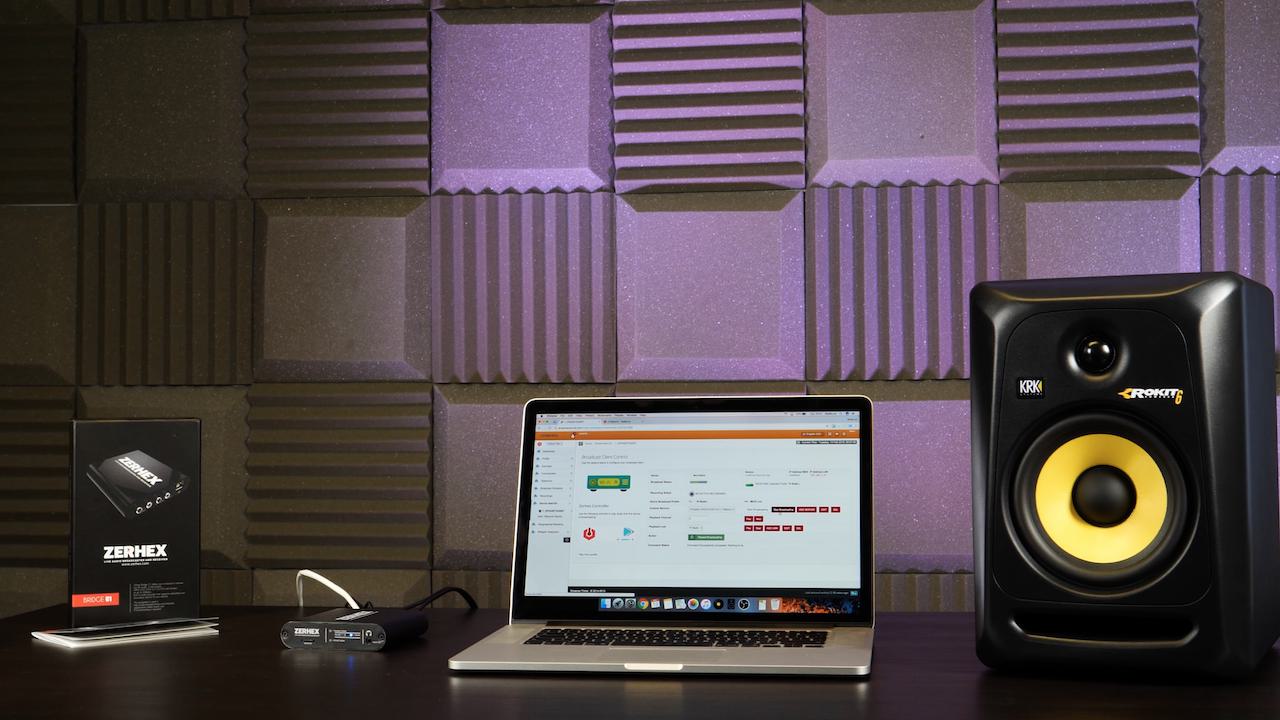 Image shows a zerhex bridge, being used to broadcast with a laptop in a sound booth.