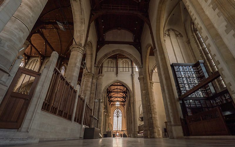 Image shows the interior of a large cathedral.