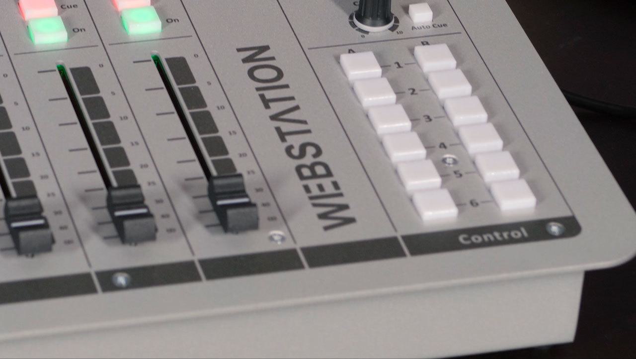 Image is a close-up of the cart buttons on the D&R WEBSTATION USB Mixer.