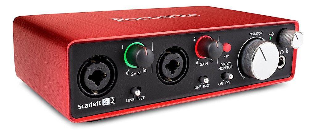 Image shows a Focusrite Scarlett 2i2 audio interface against a white background.