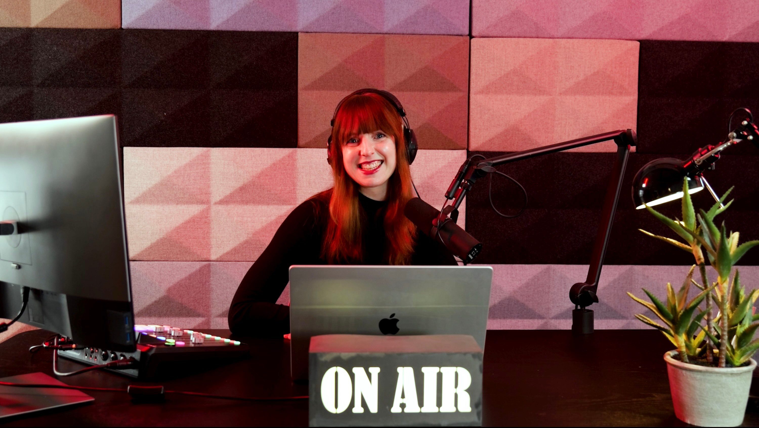 Woman broadcasting radio show in studio