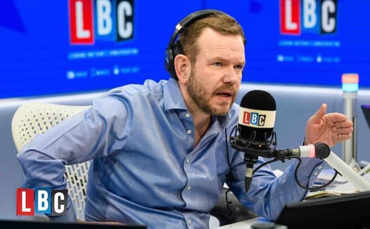 A still of LBC Presenter, James O'Brian, presenting his show from the LBC studio.