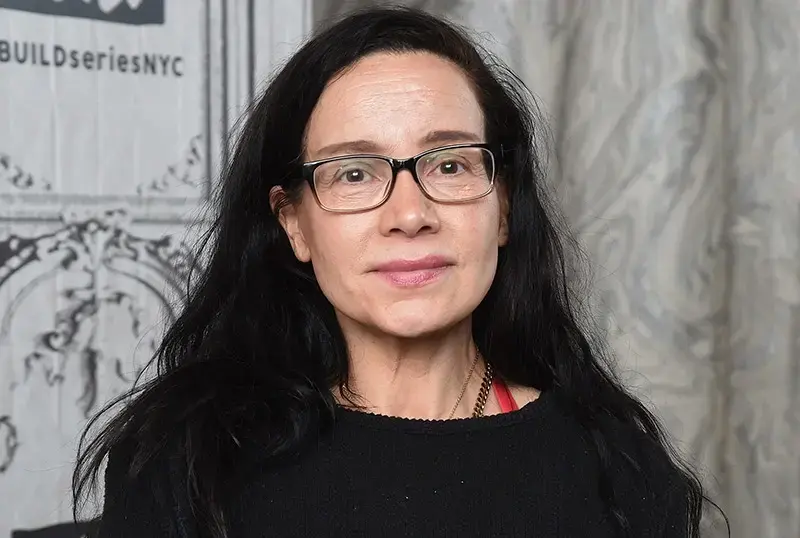 A close up photo of Janeane Garofalo.