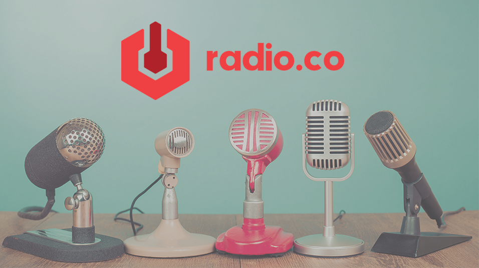 An image of 5 different mics next to each other - one is rounded and grey, one is a thin white one, the centre one is pink, the silver one next to it is square and classic, and the one on the far right is dark grey. Live Braodcast You Radio