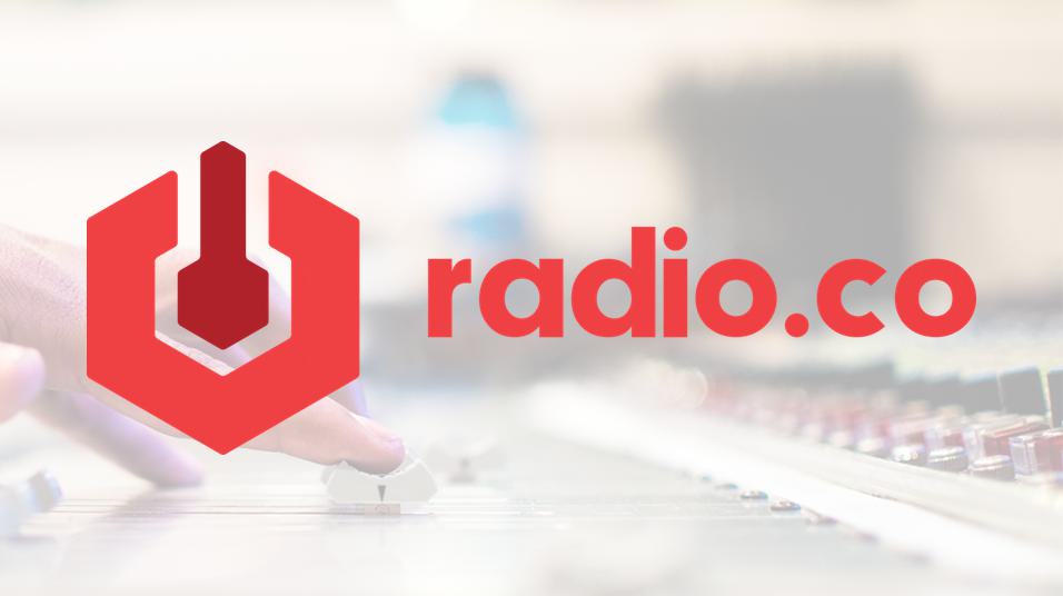 This is an image of the Radioco Logo, a red octagon with a signal in the centre, and the name radio.co next to it. It is overlayed over a blurred background of fingers on a mixing desk.