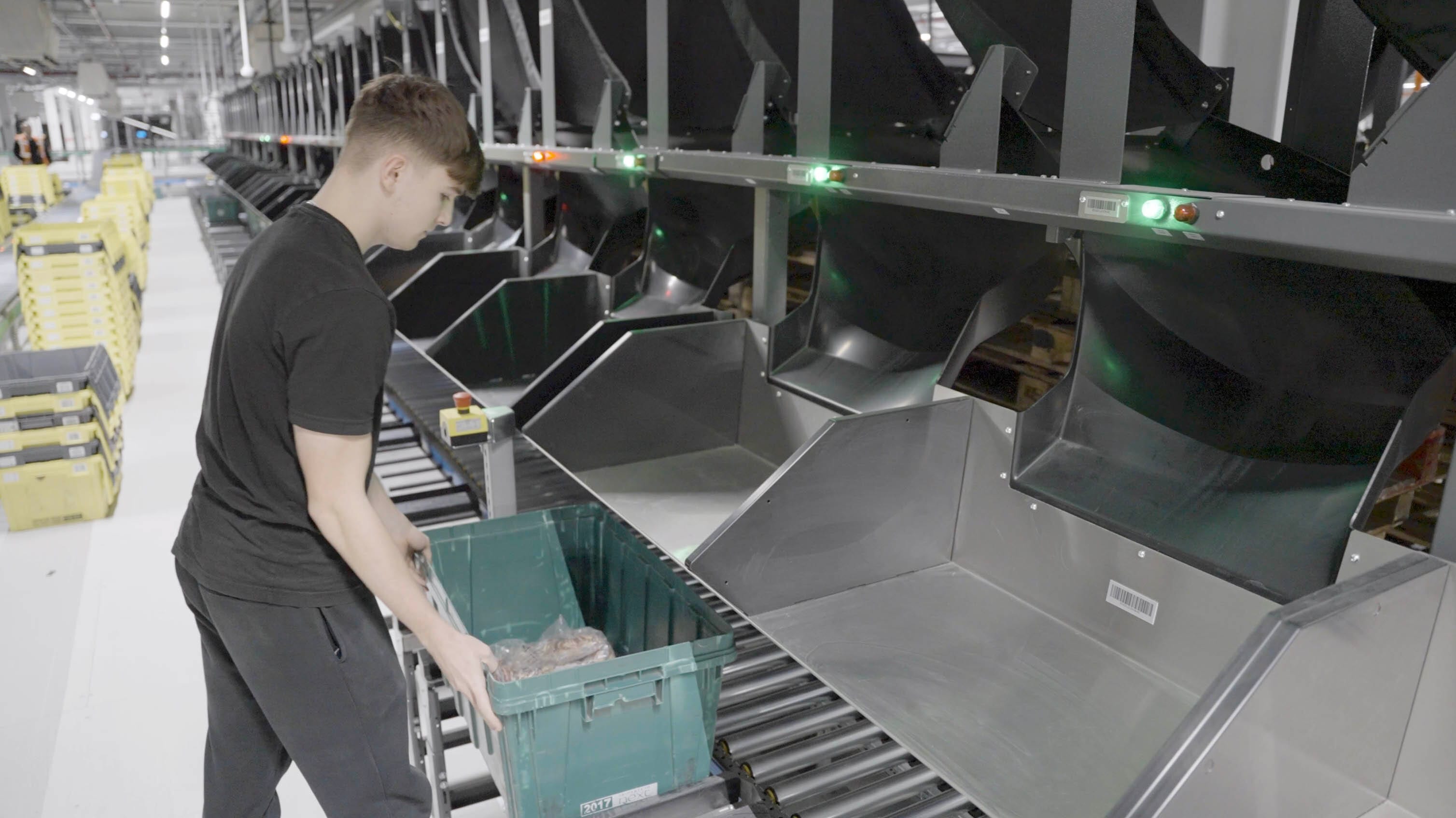 Male in warehouse collecting order to pack